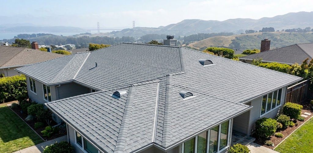 An aerial perspective captures a finished, high-quality architectural shingle roof on a premium home in the San Francisco Bay Area.